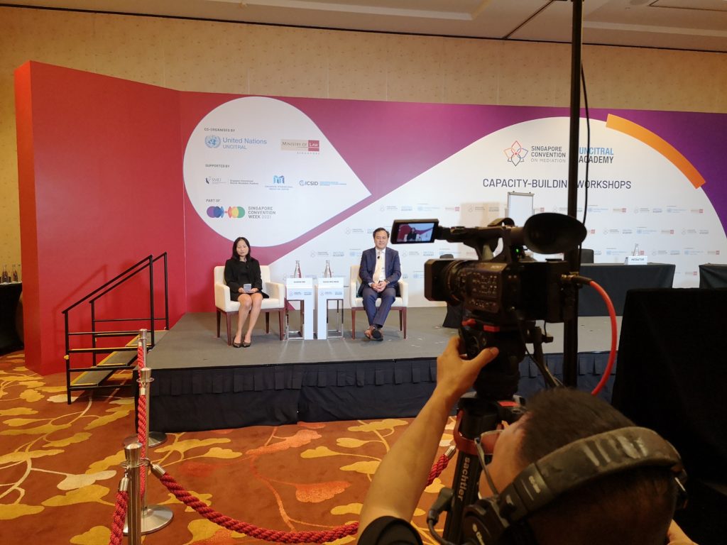 On air: Sharon Ong, Director-General (International & Advisory), Ministry of Law, and Chuan Wee Meng, CEO, SIMC.